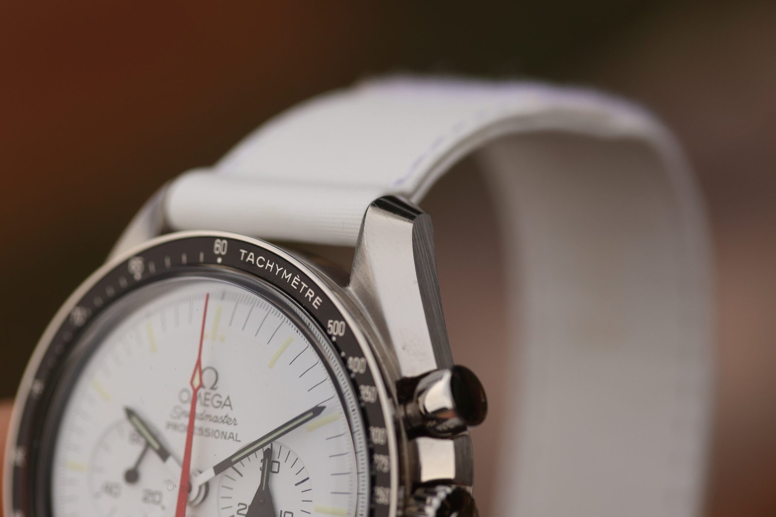 Omega Speedmaster Alaska Project ref. 311.32.42.30.04.001 — white dial straight-on: capsule subdial hands and radial numerals