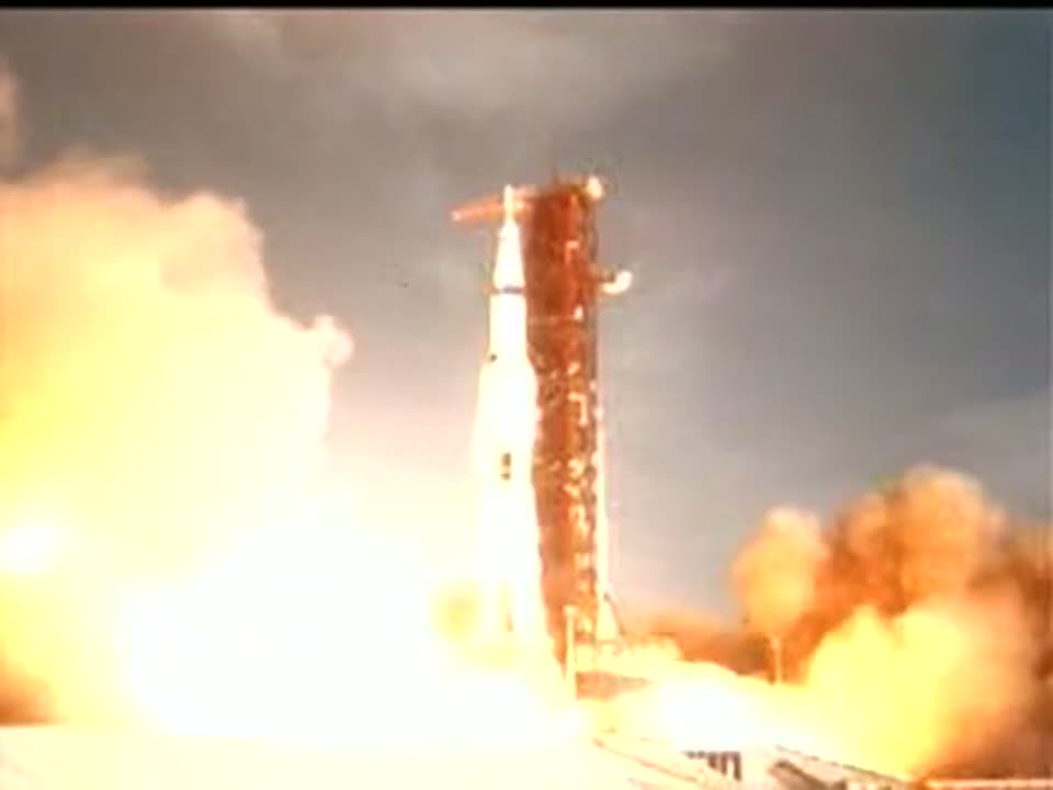 Saturn V lifting off in a plume of fire, Apollo 11