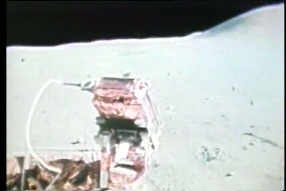 The gold-foil lunar rover on the surface at Hadley-Apennine