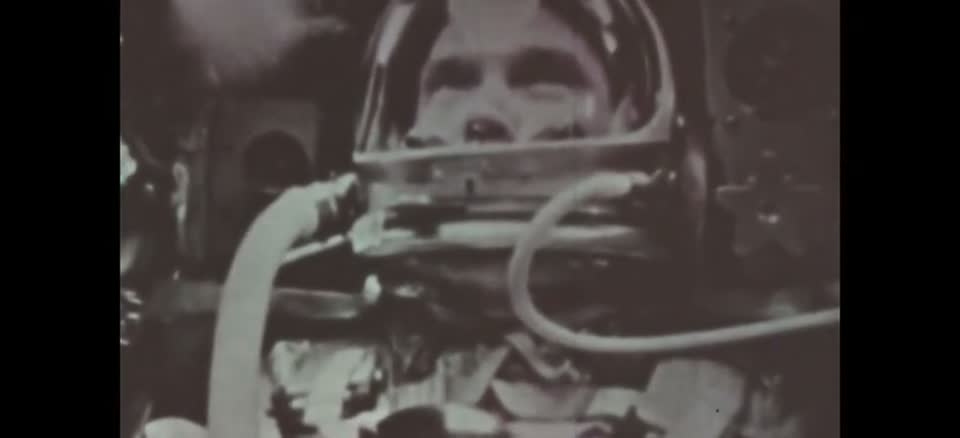Scott Carpenter in his pressure helmet aboard Aurora 7